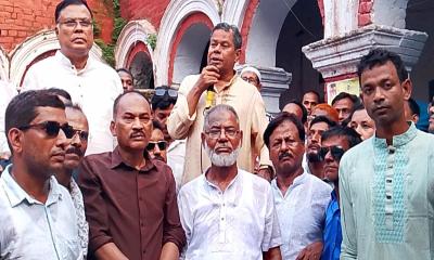 দিনাজপুরে অস্থিতিশীলতার বিরুদ্ধে শ্রমিক দলের মিছিল