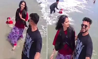 সমুদ্র সৈকতে শিশু ঢেউয়ে ভেসে যাওয়ার মুখেও রিল তৈরিতে মগ্ন বাবা মা