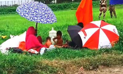 রৌমারী সীমান্তে বিএসএফের ঠেলে দেওয়া চারজনকে পরিবারের কাছে হস্তান্তর