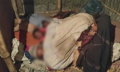 কনকনে শীতে এক কম্বলে রাত কাটে তিন সন্তানের, বসে থাকেন মা