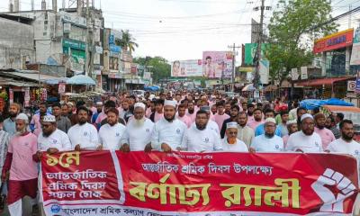 বীরগঞ্জে মে দিবসের র্যালিতে শ্রমিকদের অধিকার আদায়ের ডাক