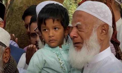 রেজাউল করিমের শিশু সন্তানকে কোলে নিয়ে কাঁদলেন জামায়াত আমির